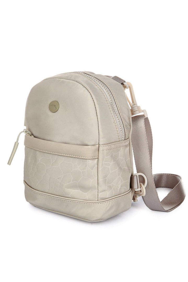 Anta Backpack (Category: Backpacks) located in Lapu Lapu. Submitted by phee_bee (Listing ID 1459350800, Image 2). Description: - Cute beige mini backpack - Subtle giraffe print on front pocket - Main zip compartment - Adjustable straps - Ideal for everyday use or travel - Lightweight and stylish.