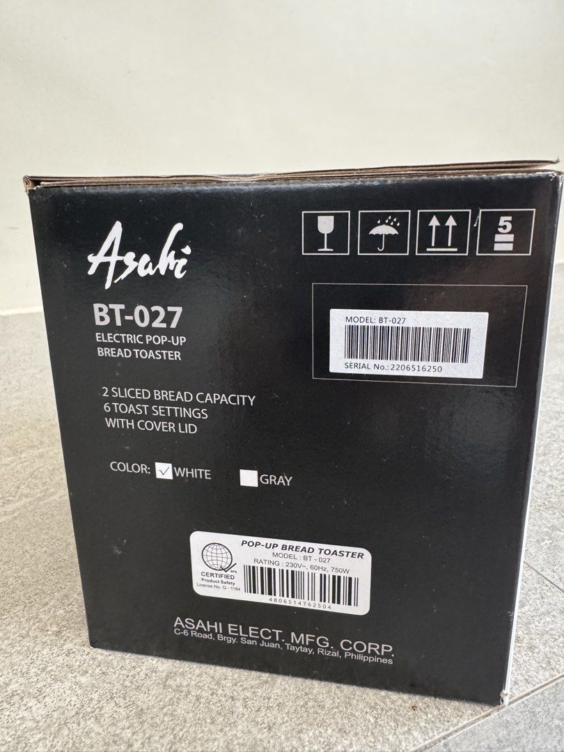 Asahi BT-027 Electric Pop-Up Bread Toaster (Category: Ovens & Toasters) located in Las Pinas. Submitted by vanethneth (Listing ID 1459358695, Image 2). Description: Selling an Asahi BT-027 electric pop-up bread toaster. It has 2 sliced bread capacity and 6 toast settings. Features a stainless steel top cover and a cool touch outer cover. Includes a cover lid and a crumb collector tray. Has cord winder storage and non-slip rubber feet. The slot is