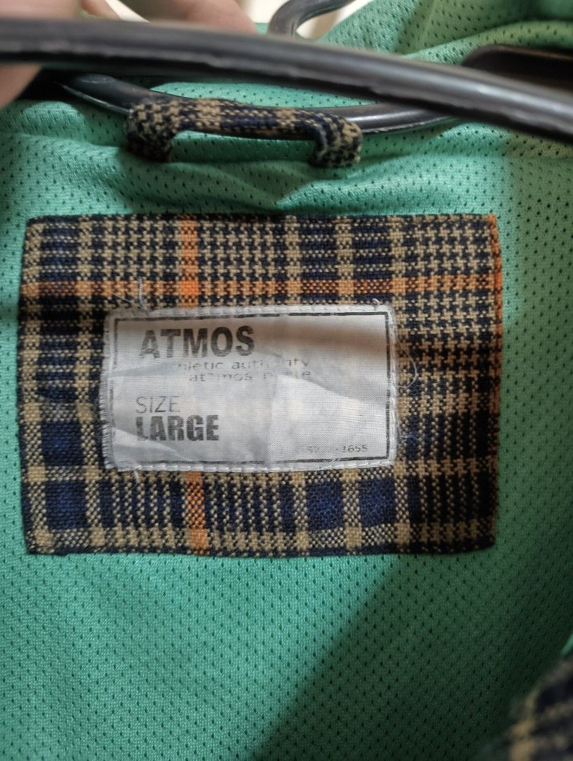 Atmos 2009 Plaid Hooded Jacket Size Large (Category: Coats, Jackets and Outerwear) located in San Pedro. Submitted by madvillainkicks (Listing ID 1459318784, Image 3). Description: - Stylish plaid jacket from Atmos - Features a convenient hood - Bright green lining for a pop of color - Durable YKK zipper closure - Includes a zippered inner pocket for secure storage - Adjustable drawstrings at the hem for a customized fit - Ideal for layering over