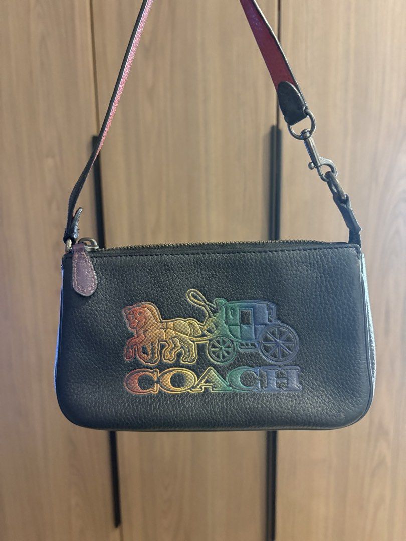 Authentic Coach Nolita Mini Shoulder Bag (Category: Shoulder Bags) located in Pasig City. Submitted by seanleonardo (Listing ID 1459358431, Image 1). Description: COACH BLACK LEATHER MINI SHOULDER BAG 👜 Coach Black Leather Mini Shoulder Bag Color: Black Material: Leather Interior: Red lining Closure: Zip closure Strap: Adjustable/removable-style shoulder strap ✨ Features: * Classic Coach design with colorful Coach horse & carriage logo * Compact