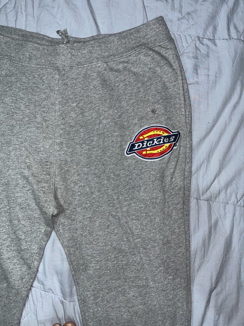 Authentic dickies jogger pants (Category: Joggers) located in Manila. Submitted by becarria_thrift23 (Listing ID 1459404845, Image 2). Description: Authentic jogger pants get nyo na mga boss Brand: Dickies Size: XL (Drawstring waist for adjustable fit) Color: Heather Grey with iconic Dickies logo patch on the hip & bold red spell-out graphic down the right leg. Condition: Great pre-owned condition—super soft interior lining, elastic cuffs, and co