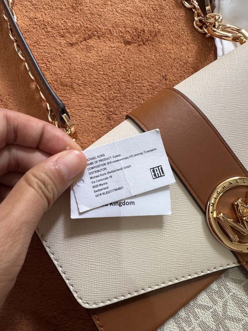 Authentic Michael Kors sling bag (Category: Cross-body Bags) located in Pasig City. Submitted by urbanstyle11 (Listing ID 1459303464, Image 3). Description: Brandnew Authentic Michael Kors bought in Milan, Italy note: no paper bag PM if interested.
