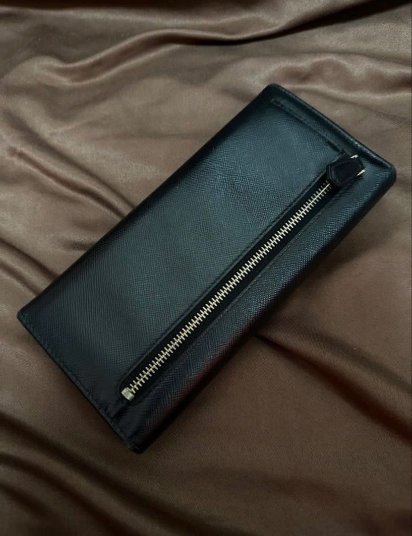 Authentic PRADA Long Wallet (Category: Luxury Bags & Wallets) located in Cavite. Submitted by trendydotnet (Listing ID 1459414416, Image 3). Description: READ BELOW! SWIPE➡️ PHOTO DETAILS 🔍ITEM GUARANTEED 💯% AUTHENTIC Authentic PRADA Long Wallet - with Authenticity Card Only - Outside Color : Black - Clean inside pockets - Signs of usage as commonly seen in preloved items - Please see detailed photo - Not for fussy buyer **Color may vary due to
