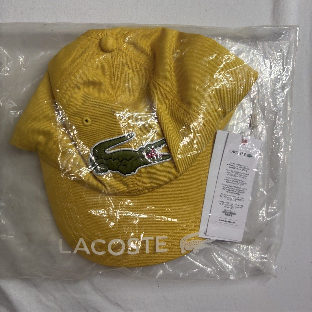 Authentic Unisex Lacoste Yellow Cap with Crocodile Logo (Category: Caps & Hats) located in Angeles City. Submitted by muse_archive (Listing ID 1459380458, Image 2). Description: - Authentic! -Unisex - One size fits most -With tag and packaging Original price 3,600 Selling it for 3,000 •Fixed price na po. Brand new po •Super steal! •Bought in the store (USA) .