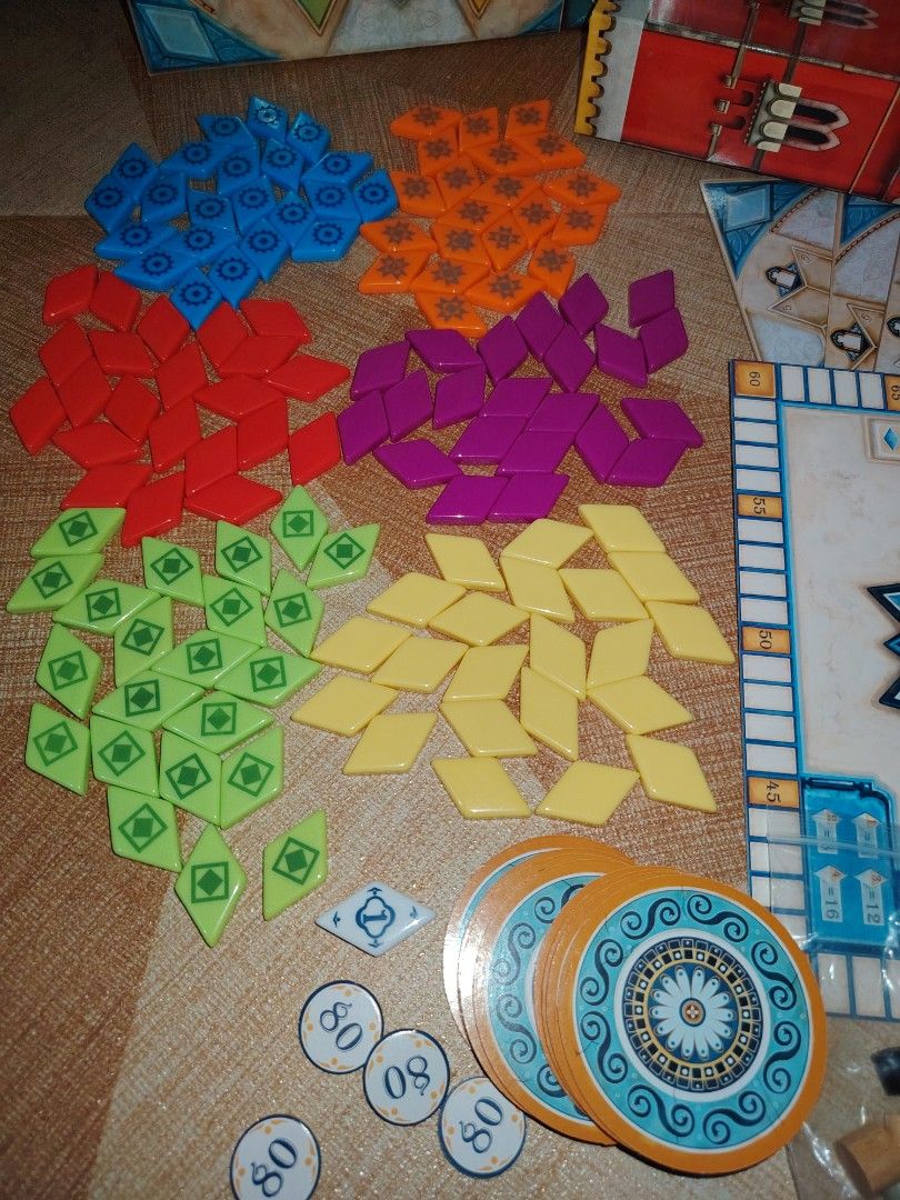 Azul Summer Pavilion Board Game (Category: Board Games & Puzzles) located in Santiago. Submitted by aceheart0118672 (Listing ID 1459293363, Image 2). Description: - Azul Summer Pavilion board game - not Complete set: 1 missing Orange tiles Includes player boards, score tower, and rulebook - All components shown in photos - Box included - Great strategy game for game nights.