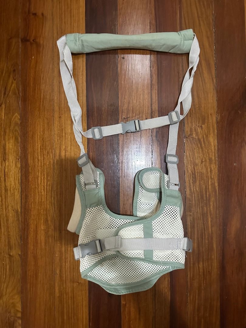 Baby Walker Harness with Handle (Category: Infant Playtime) located in Makati City. Submitted by travelfinds34611 (Listing ID 1459371601, Image 2). Description: - Helps your little one learn to walk - Adjustable straps for a secure fit - Padded for maximum comfort - Breathable mesh material - Perfect for boosting toddler confidence GREAT CONDITION. USED 1-2x. SMALL STAIN ON INNER MESH MATERIAL. (See photos for close up).