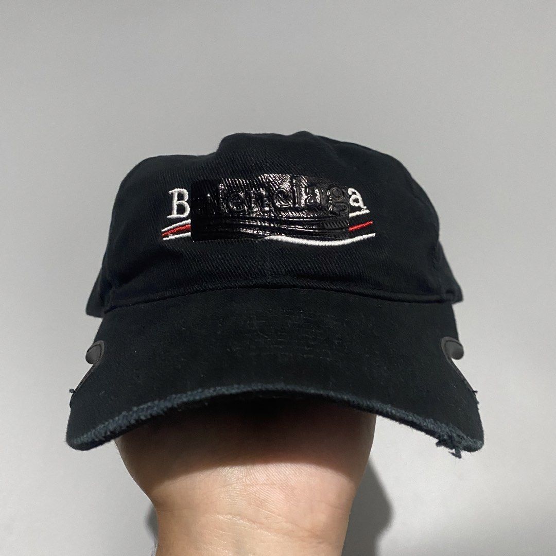 BALENCIAGA - BLACK GAFFER CAP (Category: Luxury Accessories) located in Naga. Submitted by junked_garments (Listing ID 1459420333, Image 2). Description: BALENCIAGA - BLACK GAFFER CAP CONDITION: EXCELLENT COLOR RATE: 9.5/10 ISSUE: NONE OSFA DM ME TO PURCHASE.🛒.