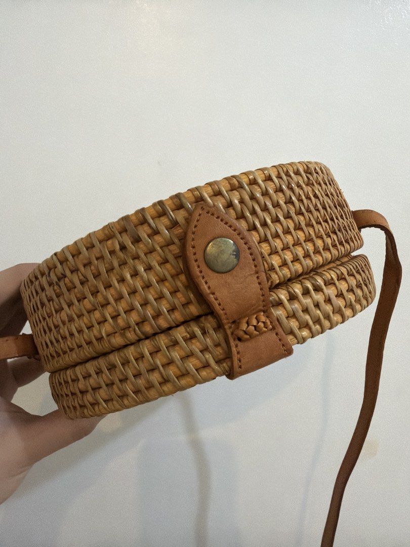 Bali Round Rattan Bag (Category: Cross-body Bags) located in Las Pinas. Submitted by gelaclosetxx (Listing ID 1459341497, Image 2). Description: - Round rattan bag bought in Bali last 2023 - Used 2-3x only.