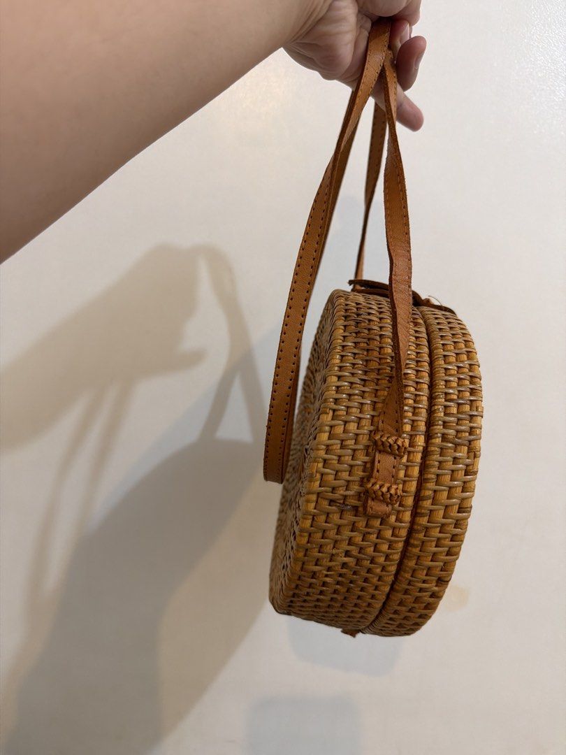Bali Round Rattan Bag (Category: Cross-body Bags) located in Las Pinas. Submitted by gelaclosetxx (Listing ID 1459341497, Image 3). Description: - Round rattan bag bought in Bali last 2023 - Used 2-3x only.