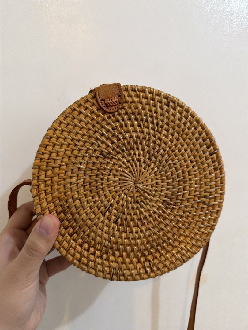 Bali Round Rattan Bag (Category: Cross-body Bags) located in Las Pinas. Submitted by gelaclosetxx (Listing ID 1459341497, Image 1). Description: - Round rattan bag bought in Bali last 2023 - Used 2-3x only.
