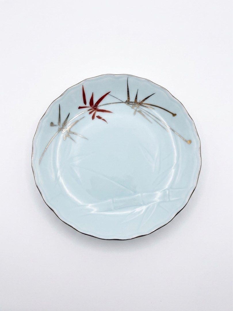 Bamboo small plates (Category: Other Kitchenware & Tableware) located in Manila. Submitted by rlab_japan_thrift (Listing ID 1459398364, Image 1). Description: Vintage Japanese Bamboo Ceramic Saucer / Small Plate Set (Set of 6) 🎋✨ Elegant Japanese porcelain small dish set featuring hand-painted gold and rust-red bamboo leaf accents, subtle embossed bamboo stalk detailing on a light celadon-tinted base, and scalloped edges. Perfect for serving tea