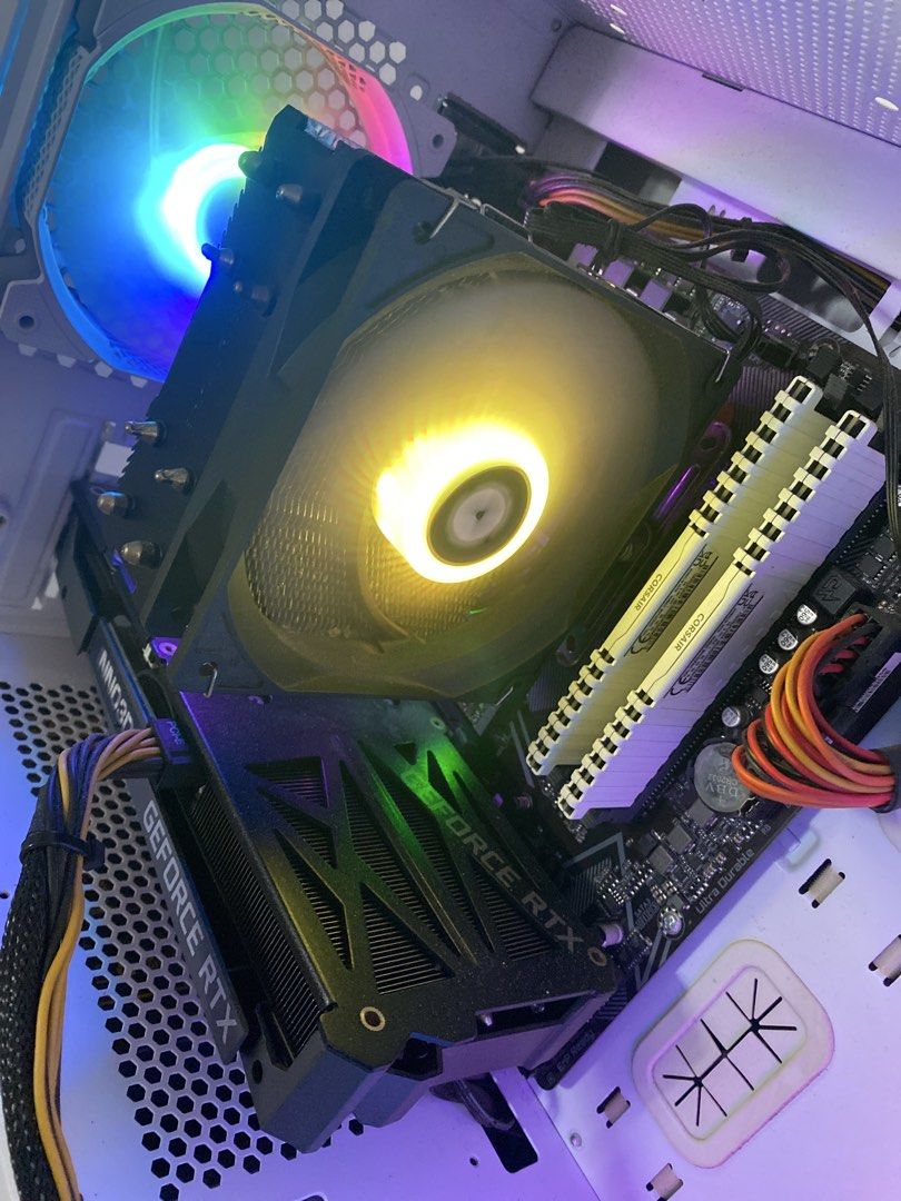Basic gaming computer 3060TI GPU (Category: Desktops) located in Singapore. Submitted by ic3teh (Listing ID 1459360408, Image 3). Description: - White Montech PC Case (side panel accessible) - 5 RGB Fans - Geforce RTX 3060TI OC - AMD Ryzen5 5600 6 cores 12 threads - CORSAIR 32GB ram (white) Can play -blackmyth wukong at mid setting -Cs2 mid setting at 300fps Dota 2, fortnite etc Includes computer + cable. Just plug and play. Self collect .