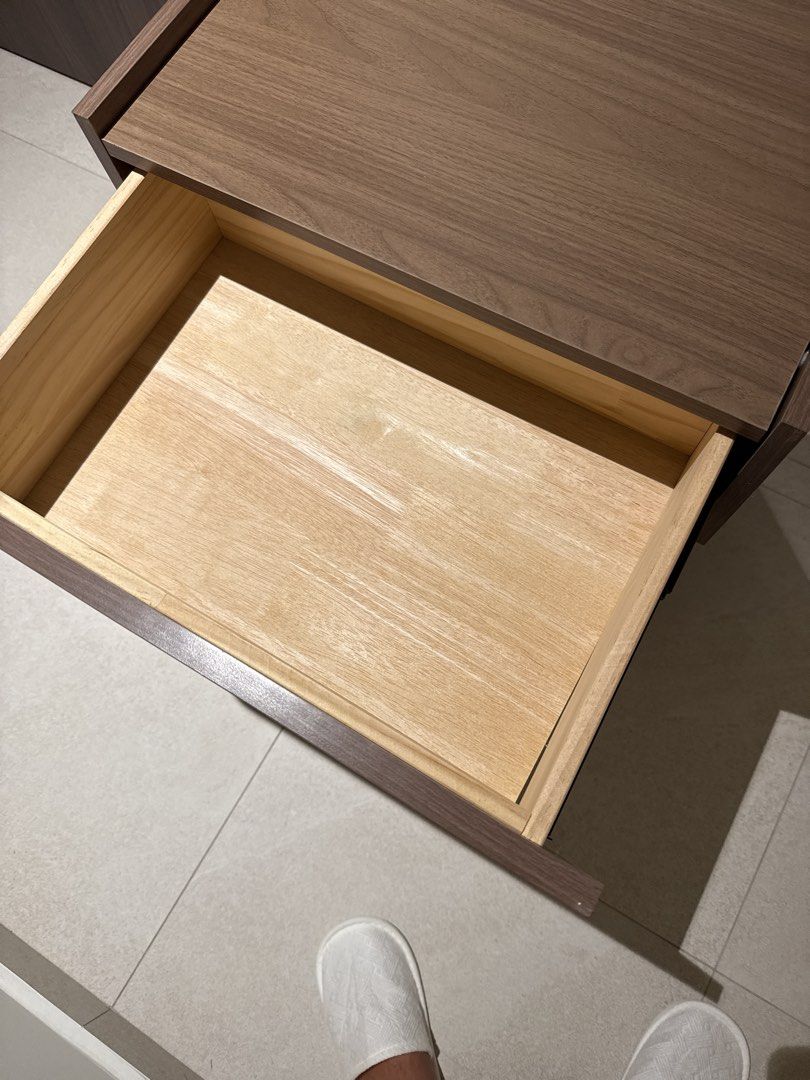Bedside Table Stackable 3 stacks (Category: Shelves, Cabinets & Racks) located in Singapore. Submitted by adalex9 (Listing ID 1459428238, Image 3). Description: - 3-drawer chest (1 drawer is a lil warped) - 67 x 50 x 40cm - Wood grain finish - Ideal for storage in any room (bedroom, living room, etc.) - Smooth-gliding drawers - Compact size, perfect for smaller spaces - Can be used as a bedside table or for extra storage - Clean interior, well-ma