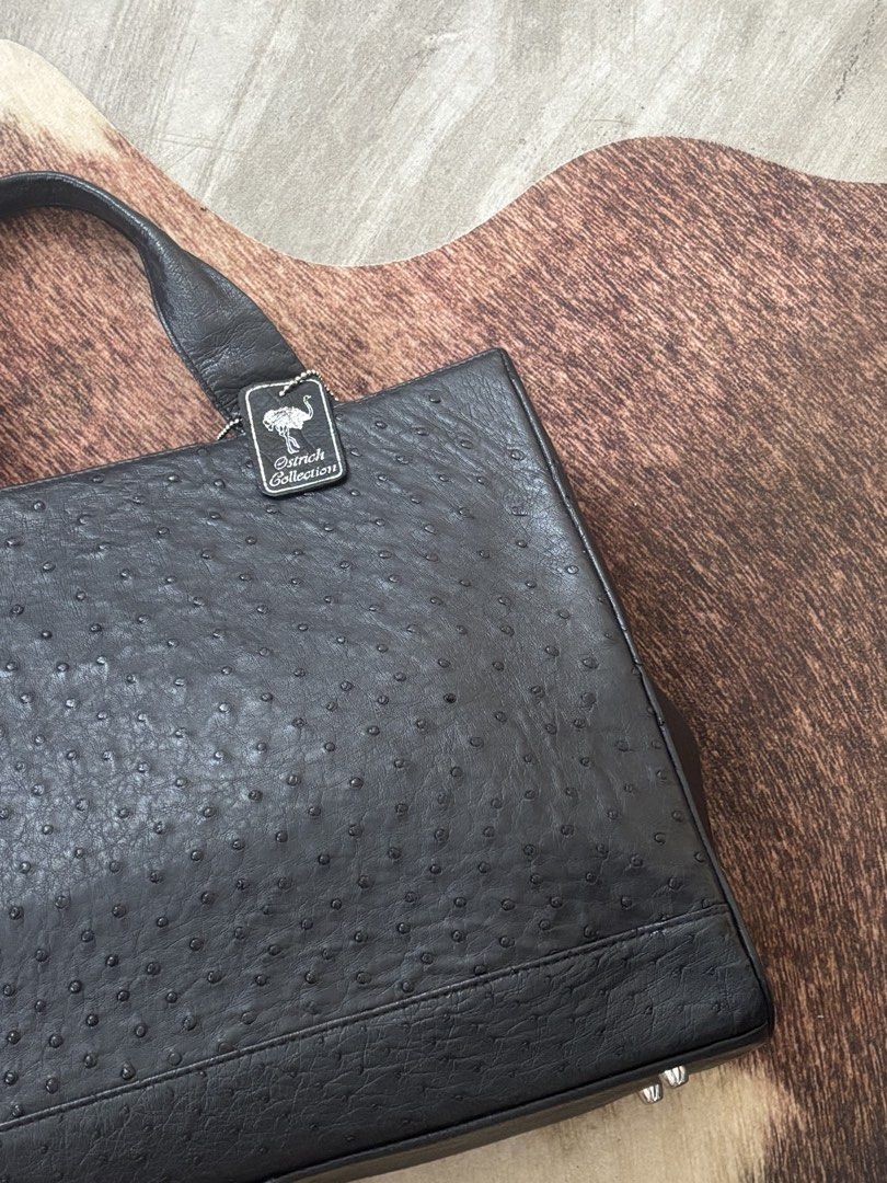 Black Ostrich Leather Handbag (Category: Luxury Bags & Wallets) located in Tagum. Submitted by ninadcanda (Listing ID 1459488354, Image 3). Description: - Made of Ostrich Leather - Handbag style - Versatile: Ideal for everyday use or special events - Spacious interior to carry your essentials - A timeless and stylish addition to any wardrobe - Size: 11 inches (height) x 13 inches (width).