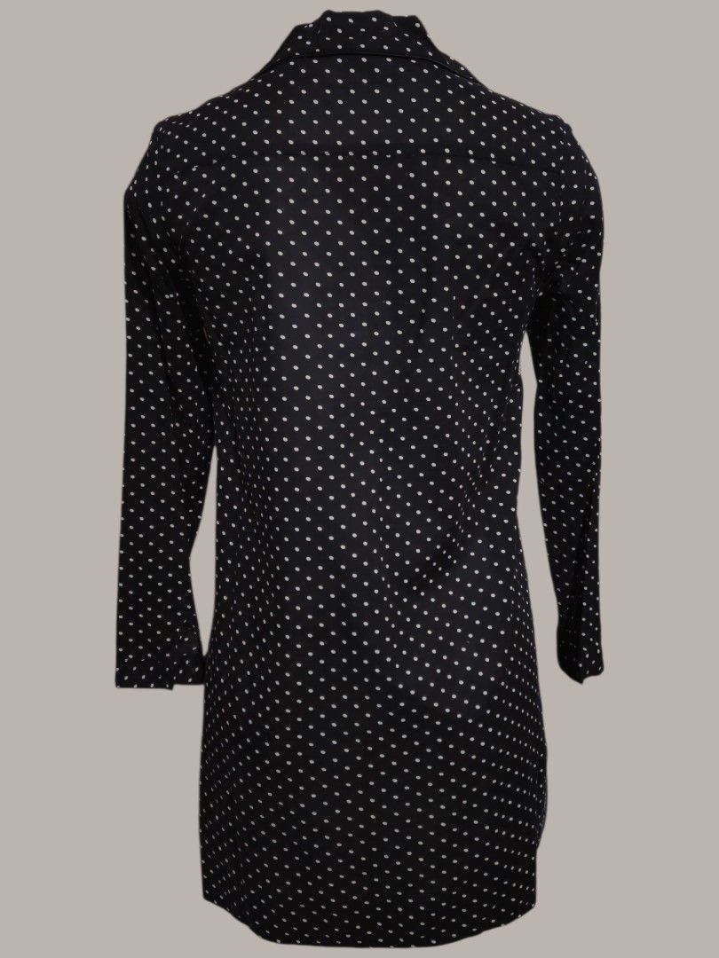 Black Polka Dot Long Sleeve Dress (Category: Dresses) located in Quezon City. Submitted by kirstenbella (Listing ID 1459446761, Image 2). Description: - Classic black dress with charming white polka dots - Elegant long sleeves and a stylish collared neckline with button details - Versatile free size design, fitting most body types.