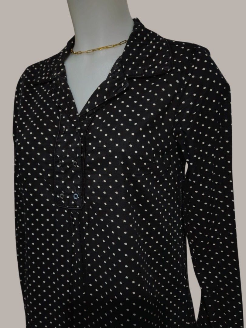 Black Polka Dot Long Sleeve Dress (Category: Dresses) located in Quezon City. Submitted by kirstenbella (Listing ID 1459446761, Image 3). Description: - Classic black dress with charming white polka dots - Elegant long sleeves and a stylish collared neckline with button details - Versatile free size design, fitting most body types.