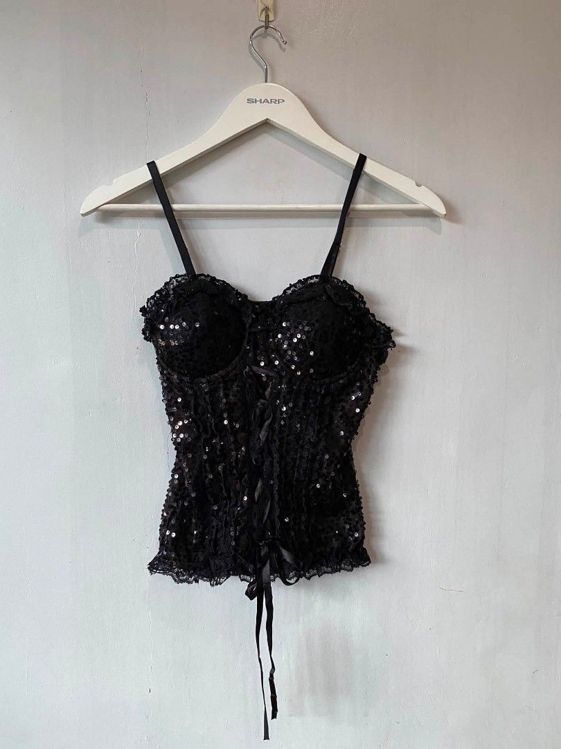 Black Sequins Corset (Category: Others Tops) located in San Carlos City. Submitted by latumsthrift (Listing ID 1459290778, Image 1). Description: Black Sequins Corset -features lace trim and a front lace-up detail, reminiscent of Cache styles from the early 2000s. Small Fit Excellent Condition Dm📩.