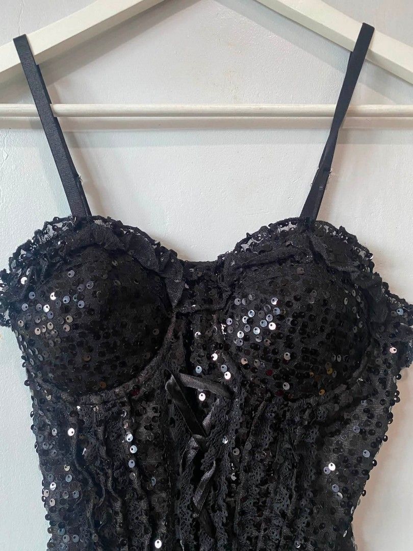 Black Sequins Corset (Category: Others Tops) located in San Carlos City. Submitted by latumsthrift (Listing ID 1459290778, Image 3). Description: Black Sequins Corset -features lace trim and a front lace-up detail, reminiscent of Cache styles from the early 2000s. Small Fit Excellent Condition Dm📩.