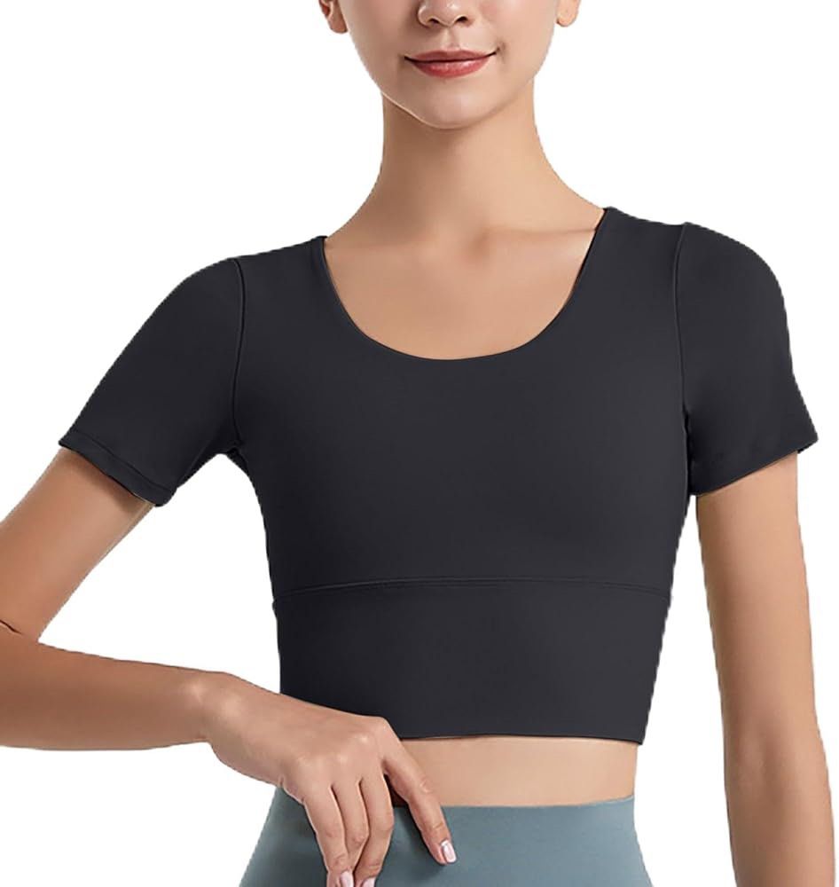 Black Short Sleeve Padded Crop Top (Category: Activewear) located in Manila. Submitted by dianafayesimbre (Listing ID 1459360932, Image 2). Description: - Black short sleeve crop top - Features a unique criss-cross strap design at the back - Made with comfortable and stretchy material - Perfect for workouts or casual outfits - Versatile: looks great with leggings or shorts - Padded crop top.