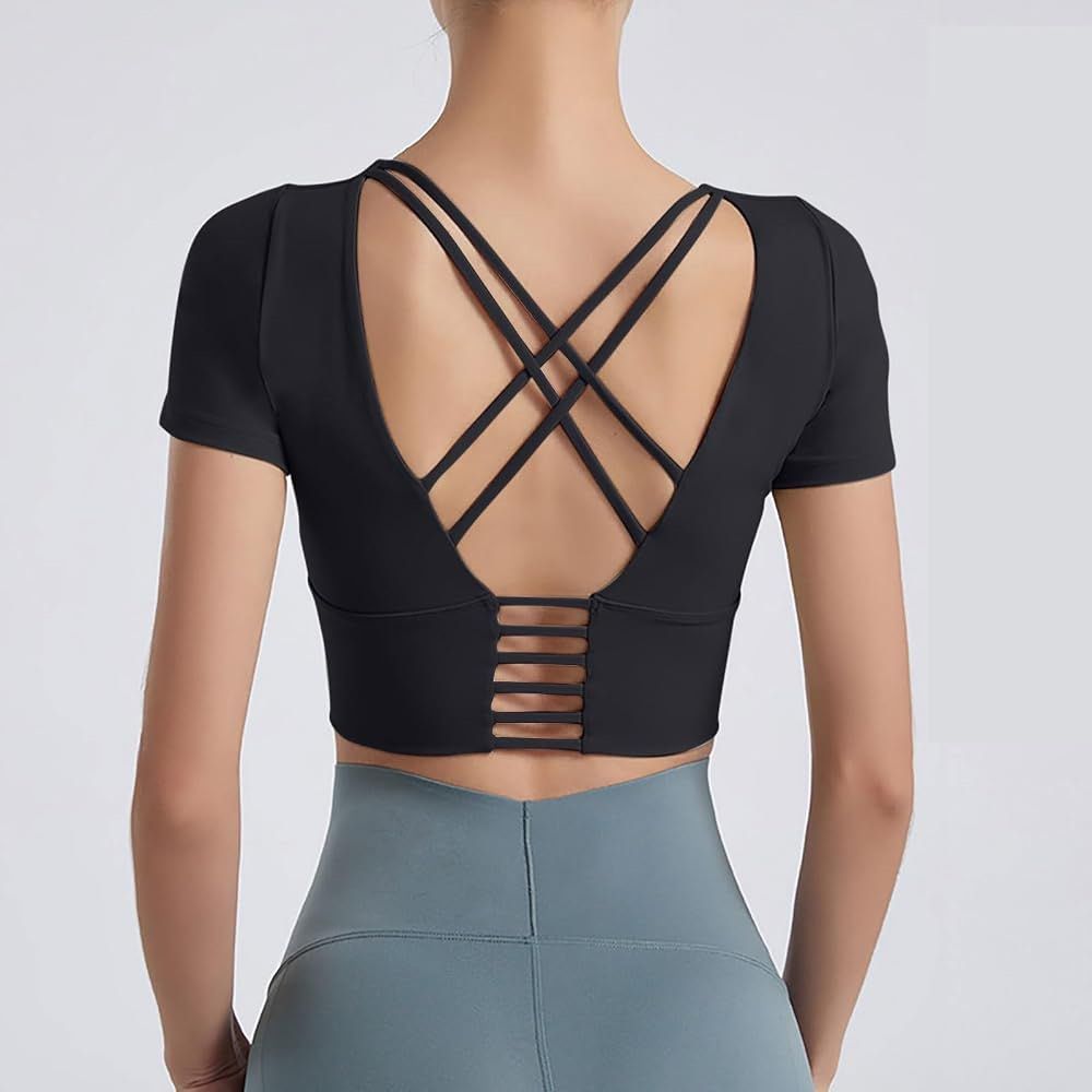 Black Short Sleeve Padded Crop Top (Category: Activewear) located in Manila. Submitted by dianafayesimbre (Listing ID 1459360932, Image 3). Description: - Black short sleeve crop top - Features a unique criss-cross strap design at the back - Made with comfortable and stretchy material - Perfect for workouts or casual outfits - Versatile: looks great with leggings or shorts - Padded crop top.