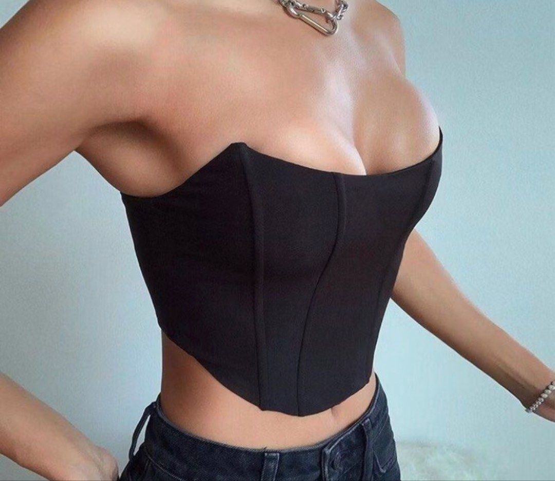Black Strapless Corset Top (Category: Others Tops) located in Manila. Submitted by m1tski (Listing ID 1459444243, Image 1). Description: - Black strapless corset top - Structured bodice - Sweetheart neckline - Cropped length - Versatile: pairs well with high-waisted jeans or skirts - Ideal for night outs or casual styling.