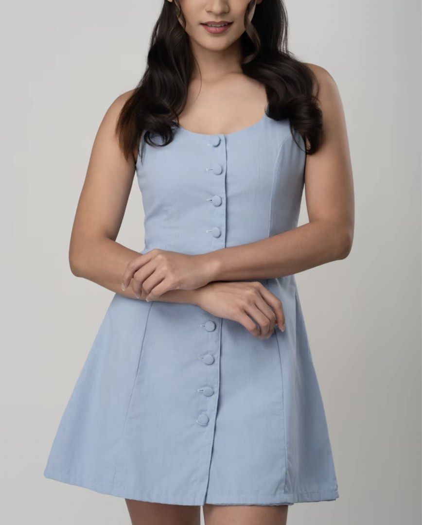 Blue Button Front Dress (Category: Dresses) located in Taguig. Submitted by jocends (Listing ID 1459463048, Image 1). Description: - Powder blue Ella Dress from Dear Velvy - Size Large - Button front style - Adjustable tie at the back - Made from a comfortable linen-blend fabric - Please check the size chart for exact measurements - RFS: Got the wrong size.