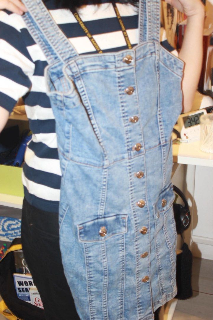 Blue Denim Button-Up Pinafore Dress with Pockets (Category: Dresses) located in Manila. Submitted by goldie.lockes (Listing ID 1459400255, Image 1). Description: - Cute blue denim pinafore dress - Button-up front - Two chest pockets - Adjustable straps - Perfect for layering over t-shirts or tops - Ideal for casual outings Price is negotiable Goldie Lockes.