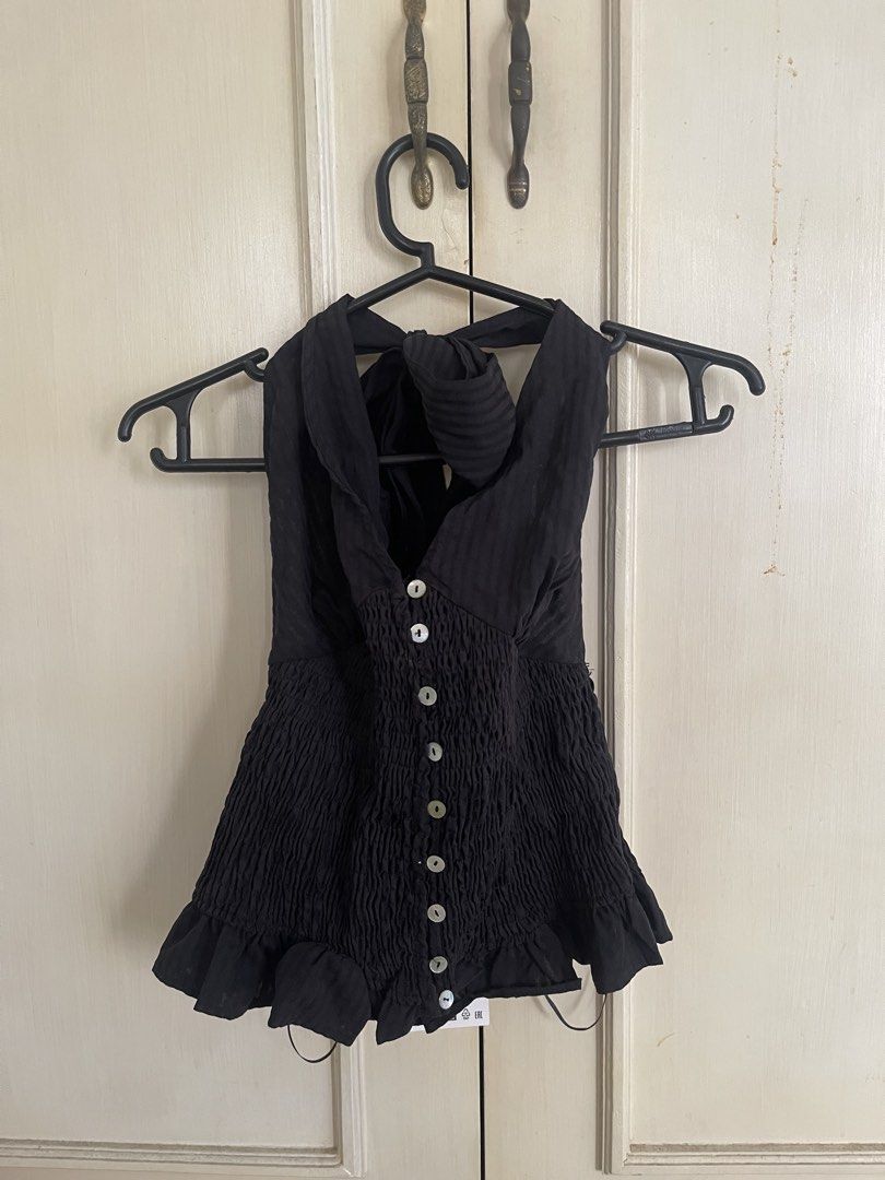 BNWT Black Halter Neck Button-Down Shirred Top with Tie Back (Category: Dresses) located in Makati City. Submitted by miguelalv46673 (Listing ID 1459303133, Image 3). Description: Selling my BNWT Black Halter Neck Button-Down Shirred Top with Tie Back RFS: was supposed to give this as a gift kaso FO na kami Original Price: P 1995.