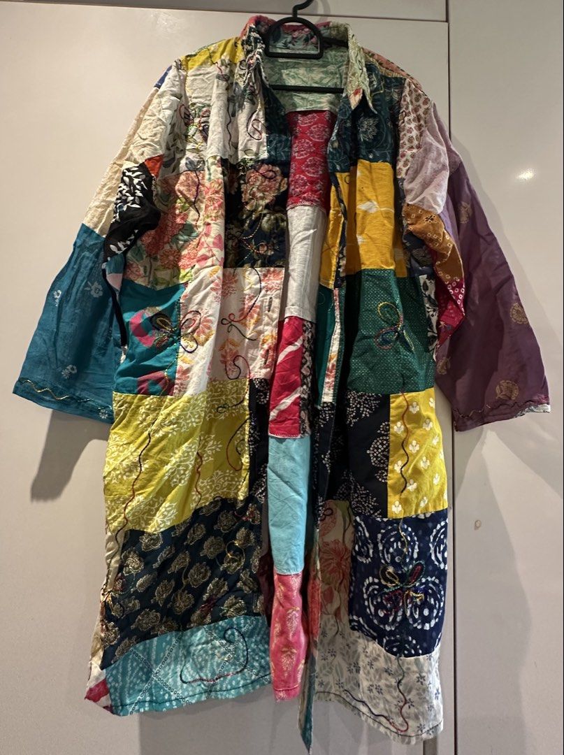 Boho Patchwork Kimono Jacket (Category: Coats, Jackets and Outerwear) located in Singapore. Submitted by resurgam2023 (Listing ID 1459454586, Image 1). Description: - Unique patchwork kimono jacket - Mix of vibrant fabrics and patterns - Lightweight and flowy, perfect for layering - Adds a pop of color to any outfit - One size fits most - Handcrafted feel.