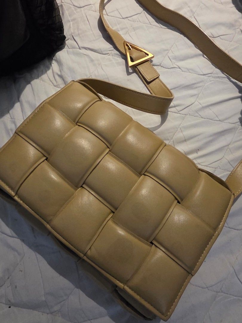 Bottega Veneta Padded Cassette Pouch (Category: Luxury Bags & Wallets) located in Quezon City. Submitted by jek017 (Listing ID 1459145970, Image 1). Description: - Authentic Bottega Veneta Pouch - Padded Cassette Design - Neutral Taupe Color - Signature Intrecciato Weave - Gold-tone Hardware with BV Logo - Ideal for carrying essentials.