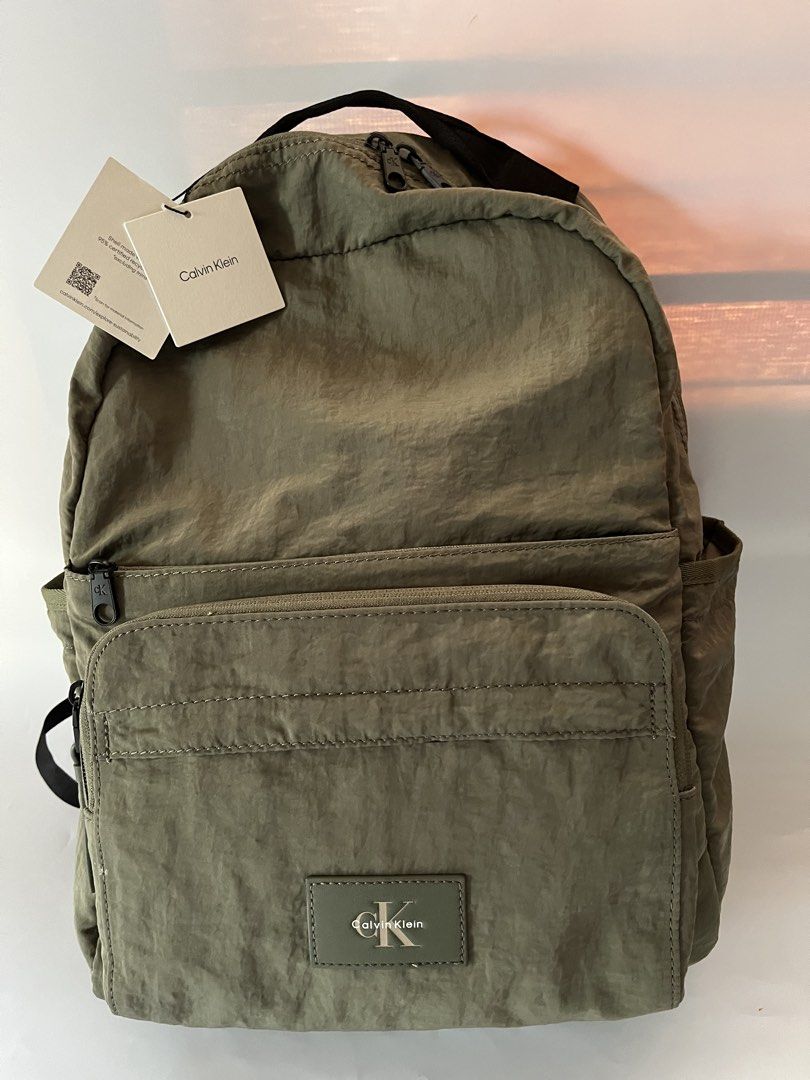 Calvin Klein Bagpack (Category: Luxury Bags & Wallets) located in Santa Rosa. Submitted by ninaparis (Listing ID 1459338913, Image 2). Description: Original CK Nylon Bagpack size Large with laptop compartment.