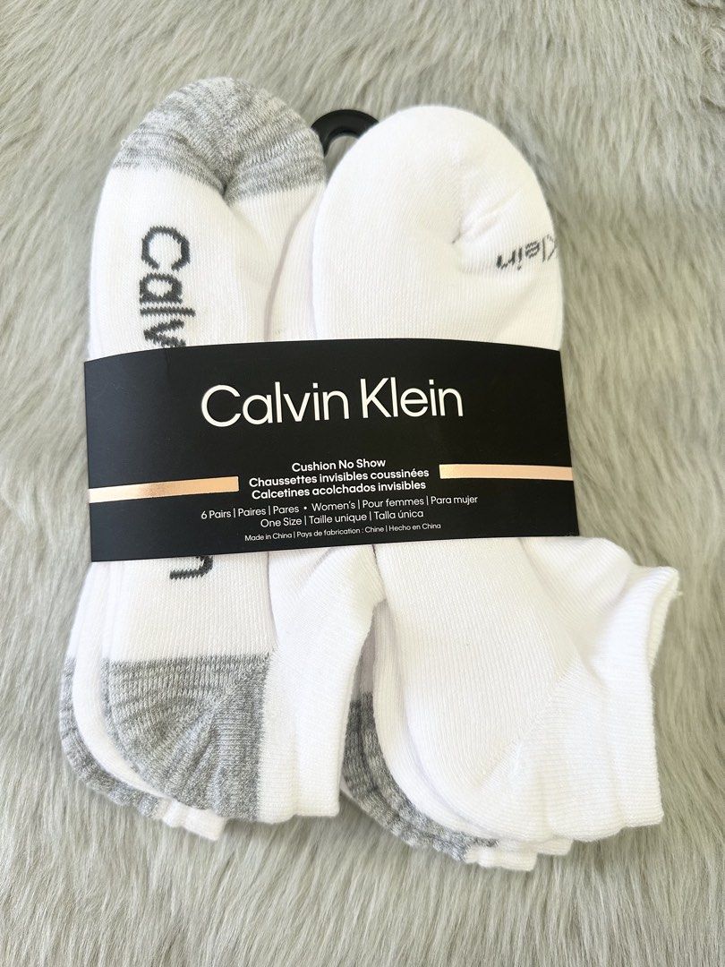 Calvin Klein Cushion No Show Socks - 6 Pairs (Category: Socks & Tights) located in Makati City. Submitted by rinz11 (Listing ID 1459431007, Image 1). Description: - 6-pair pack of Calvin Klein cushion no-show socks - Women's one size - Color: White with grey heel and toe accents - Ideal for everyday wear .
