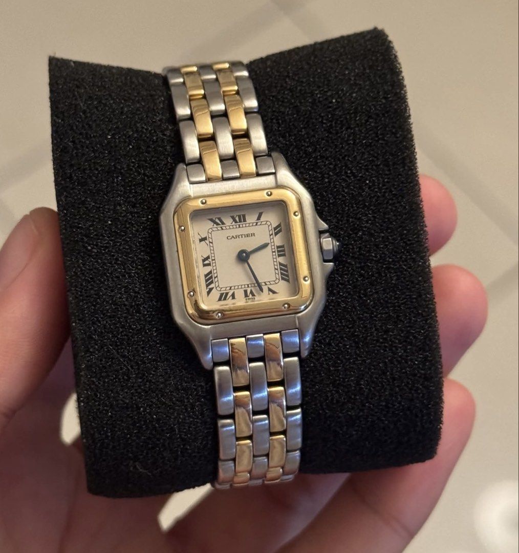 Cartier Panthere 2-tone (Category: Luxury Watches) located in Bulacan. Submitted by youlovewatches (Listing ID 1459351141, Image 2). Description: Cartier Panthere 2-Rows Gold Case size: 22mmx22mm Material: 18k & Stainless Steel Movement: Quartz Movement Size: Fit up to 15.8cm wrist Dial & Digits: White Roman Numeral dial Crown: Blue Cabochon Sapphire-set Guaranteed Authentic One of the "Most Iconic & Must Have" in Cartier Collections. Open for La