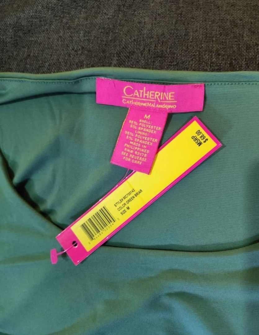 Catherine Malandrino Ruched Long Sleeve Maternity top (Category: Longsleeves) located in Baguio. Submitted by wear_mo_clothing_shop (Listing ID 1459408933, Image 3). Description: - Catherine Malandrino long sleeve top - Flattering side ruching detail - Comfortable polyester and spandex blend for stretch - Available in green and red - Original tags attached - Versatile for dressing up or down.
