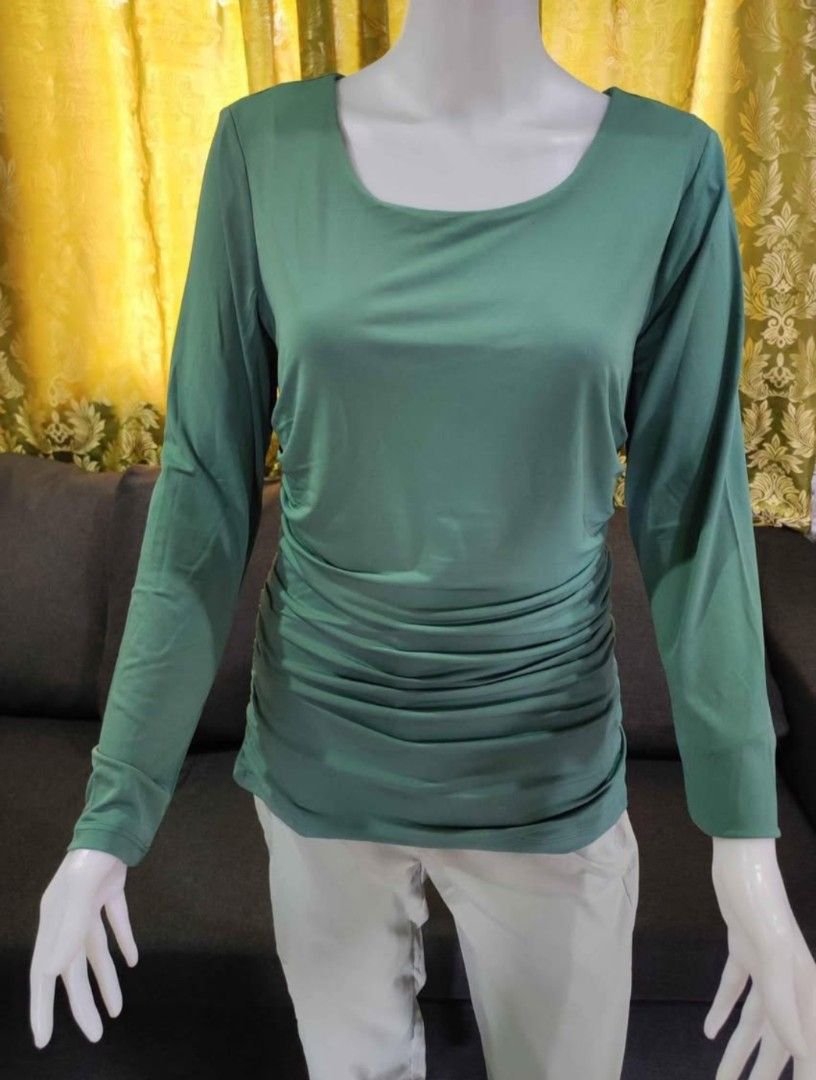 Catherine Malandrino Ruched Long Sleeve Maternity top (Category: Longsleeves) located in Baguio. Submitted by wear_mo_clothing_shop (Listing ID 1459408933, Image 2). Description: - Catherine Malandrino long sleeve top - Flattering side ruching detail - Comfortable polyester and spandex blend for stretch - Available in green and red - Original tags attached - Versatile for dressing up or down.