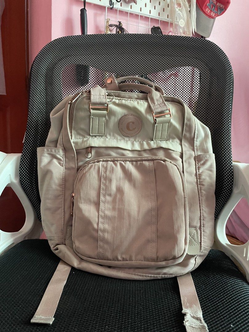 cose Backpack Beige Rose Gold Hardware (Category: Backpacks) located in Cainta. Submitted by amalia.shop (Listing ID 1459305335, Image 1). Description: - Elegant rose gold hardware - Multiple storage pockets: front zip, side, and secure back zip - Adjustable straps for a comfortable fit - Ideal for everyday errands or your next adventure.