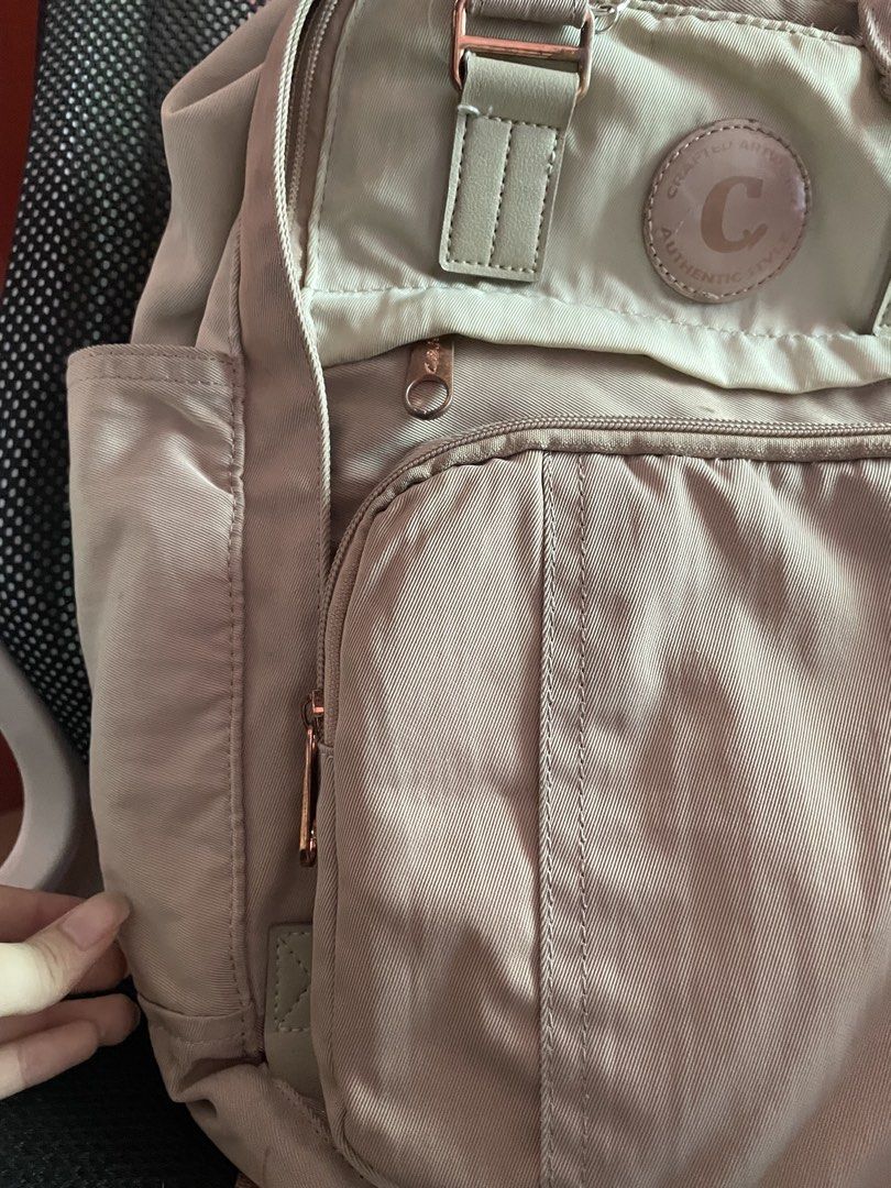 cose Backpack Beige Rose Gold Hardware (Category: Backpacks) located in Cainta. Submitted by amalia.shop (Listing ID 1459305335, Image 2). Description: - Elegant rose gold hardware - Multiple storage pockets: front zip, side, and secure back zip - Adjustable straps for a comfortable fit - Ideal for everyday errands or your next adventure.