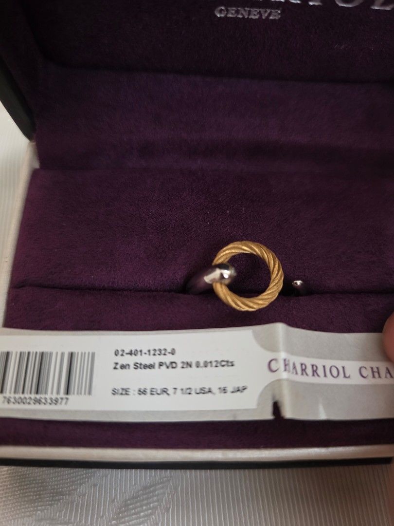 Charriol Infinity Zen Ring (Category: Rings) located in Manila. Submitted by lhbjzbm (Listing ID 1459348781, Image 3). Description: Drawing her inspiration from the serene and tranquil Japanese gardens she has enjoyed visiting in the past, art director Coralie Charriol-Paul has designed this stunning open-shank ring with minimalism in mind. Perfectly balanced and proportioned, it features a tapering stainless steel circle and a loop of our iconic