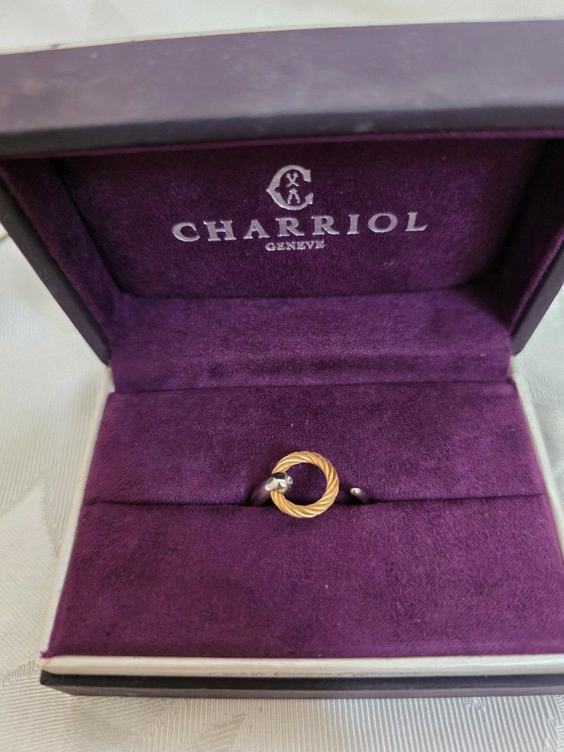 Charriol Infinity Zen Ring (Category: Rings) located in Manila. Submitted by lhbjzbm (Listing ID 1459348781, Image 2). Description: Drawing her inspiration from the serene and tranquil Japanese gardens she has enjoyed visiting in the past, art director Coralie Charriol-Paul has designed this stunning open-shank ring with minimalism in mind. Perfectly balanced and proportioned, it features a tapering stainless steel circle and a loop of our iconic