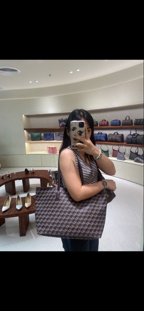 Christy Ng Large Russo Chestnut brown (Category: Luxury Bags & Wallets) located in Manila. Submitted by DECLUTTERWITHADA (Listing ID 1459383251, Image 1). Description: - Leather trim and handles - Spacious interior, ideal for travel or everyday use - Guaranteed authentic, purchased from a reputable boutique.