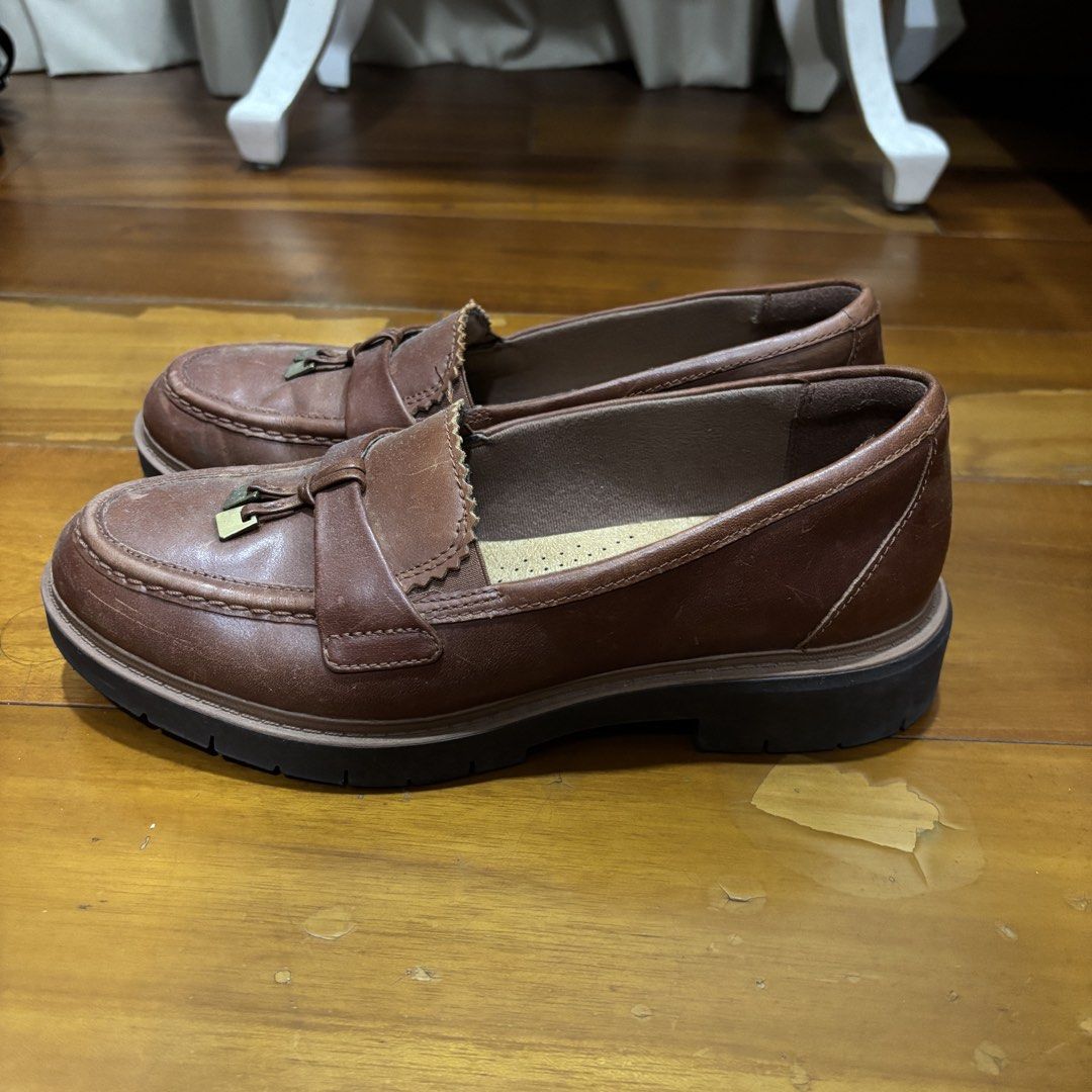 Clarks Brown Leather Loafers (Category: Loafers) located in Manila. Submitted by booksandbeyond (Listing ID 1459411298, Image 2). Description: size 7 (24) - bought in the states, no box - Brand: Clarks Collection - Material: Brown Leather - Features: Cute tassel detail on front strap, comfortable slip-on style - Soles: Thick and durable - Occasion: Great for casual or smart-casual outfits - Condition: Minor scuffs on leather, consistent with norm