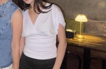 Classy White V-neck Ruched Top (Category: Blouses) located in Manila. Submitted by de.clutterthings (Listing ID 1459324319, Image 3). Description: - Fits XS-M - Ruched detailing for a flattering fit - Wrap style cinches at the waist - Short, fluttery sleeves - Pairs perfectly with low-waisted bottoms - Comfortable and stylish for any occasion - Easy to dress up or down.