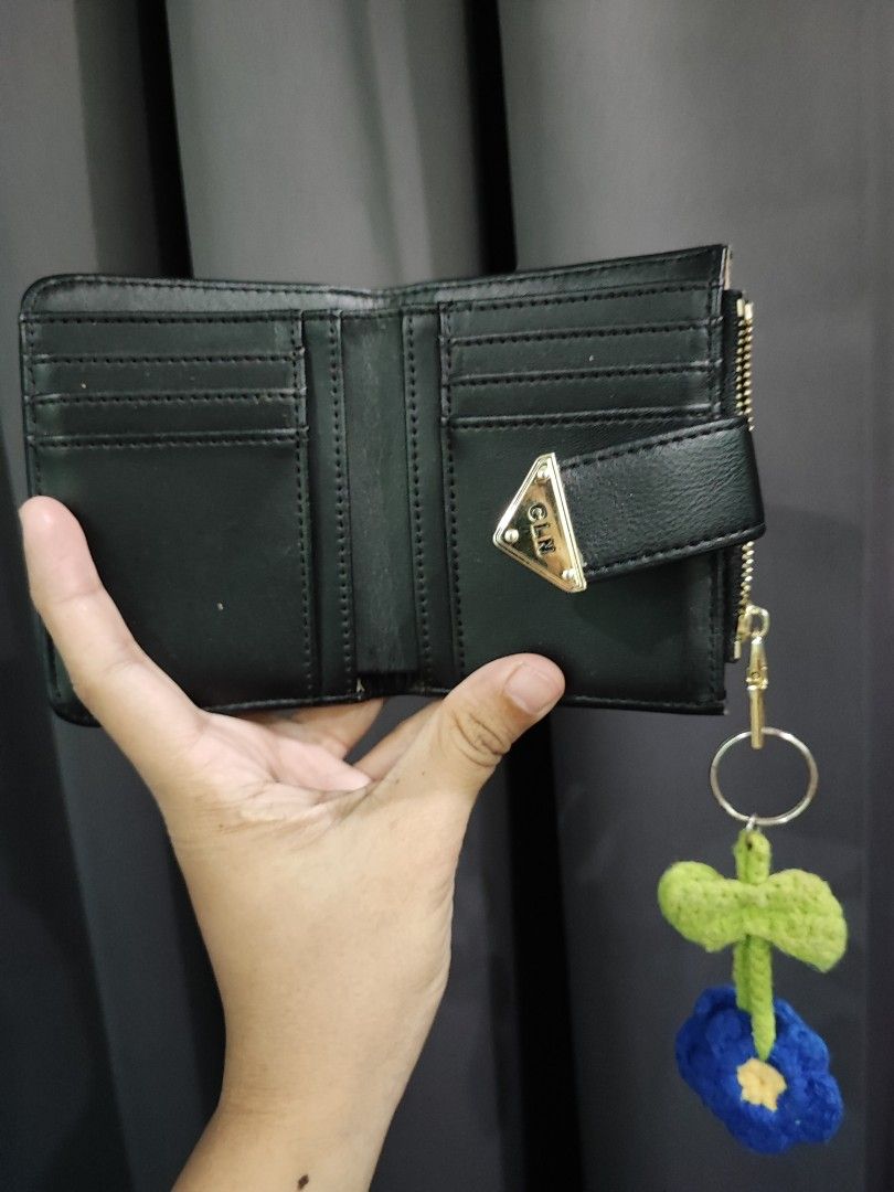 CLN bifold wallet (Category: Luxury Bags & Wallets) located in Tarlac. Submitted by camssyyyyy (Listing ID 1459315739, Image 2). Description: CLN Bifold Wallet - no box and paper bag and receipt ( tinapon na ) - bought if from CLN ( sm clark ) - Good as New RFS : decluttering dm for more details. Thankyou.