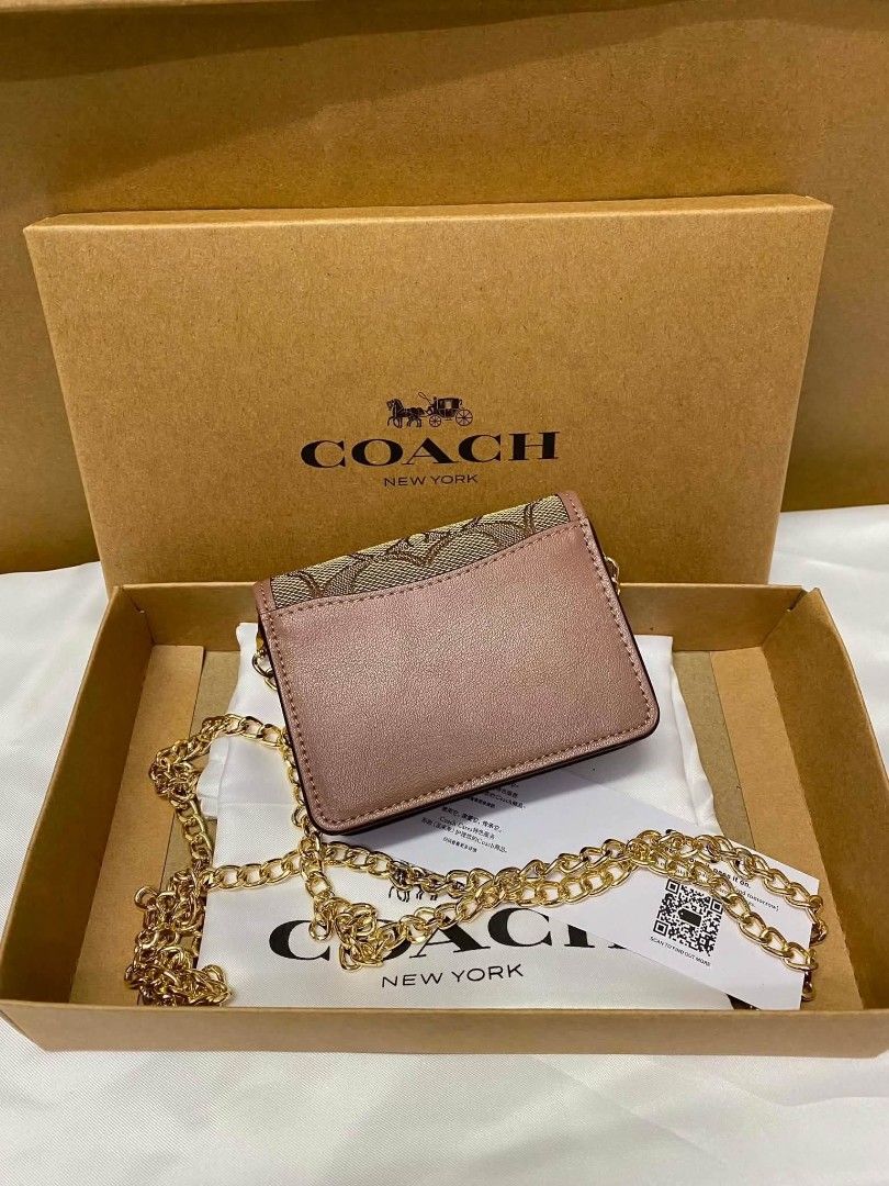 Coach Chain Mini Sling Wallet (Category: Wallets & Card holders) located in Manila. Submitted by msddirectfactoryoutlet (Listing ID 1459390343, Image 2). Description: Chain Mini Wallet 4" (L) x 3" (H) x 1" (W) US Grade 100%.