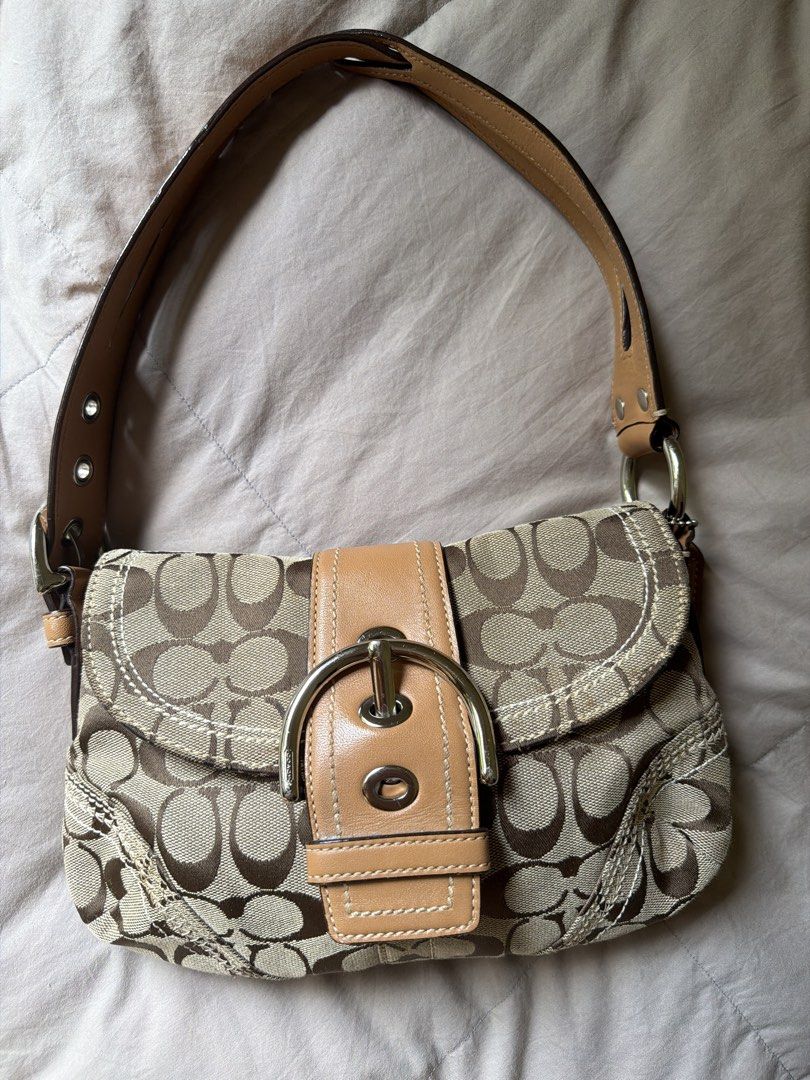 Coach Monogram Canvas Leather Trim Shoulder Bag (Category: Luxury Bags & Wallets) located in Dumalag. Submitted by pili.ph (Listing ID 1459294358, Image 3). Description: AUTHENTIC VINTAGE COACH SOHO 🤎 Style No. 10602 | Vintage/Y2K ✨ Good vintage condition ✨ Signature Canvas + leather trim ✨ With creed/serial ✨ Actual photos posted 📩 PM for sure buyers 📦 Shipping via buyer’s expense #VintageCoach #CoachSoho #Coach10602 #CoachPH.