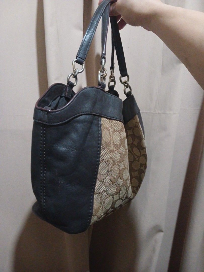 Coach Monogram Canvas Leather Hobo Shoulder Bag (Category: Luxury Bags & Wallets) located in Manila. Submitted by acezenergy (Listing ID 1459407106, Image 2). Description: - Authentic Coach hobo bag - Signature C monogram canvas - Black leather trim - Silver hardware - Comfortable shoulder straps - Spacious interior - Ideal for everyday use.