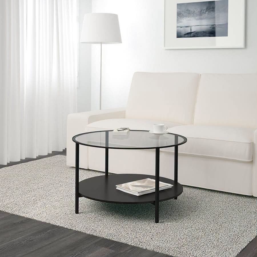 Coffee table (Category: Tables & Sets) located in Meycauayan. Submitted by marygracecasimiro (Listing ID 1459468636, Image 2). Description: 😍MINIMALIST BEAUTY!!! Round Contemporary Coffee / Center Table Glass Top, Solid Wood 2nd Tier, Metal Frame Price : 7500 ✅ Diameter : 30 inches Height : 18 inches In VERY good condition 💜💜.