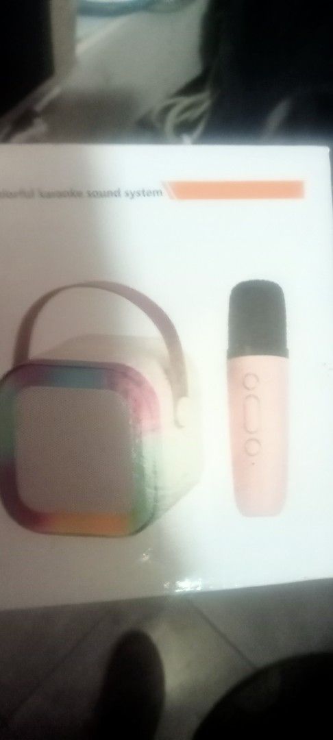 Colorful Karaoke Sound System with Microphone (Category: Soundbars, Speakers & Amplifiers) located in Paranaque City. Submitted by dimaguilaa94969 (Listing ID 1459332624, Image 1). Description: - Portable karaoke sound system - Includes speaker and pink microphone - Speaker features a colorful design pm of interested 09260966619 - Ideal for parties and singing practice - Lightweight and easy to transport.