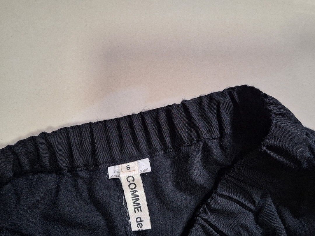 Comme des Garçons / Wide Leg Pants ( Authentic ) (Category: Trousers) located in Cebu City. Submitted by thehiddengemsbykid (Listing ID 1459400063, Image 2). Description: Comme des Garcons Wide Leg Pants Size : Small Waist - 26 up to 36 max Rise - 16 Thigh - 17.5 Length - 32 Leg Opening - 9 Pls check all details posted Verygood Condition No issues 1,800 + Sf Thank you....