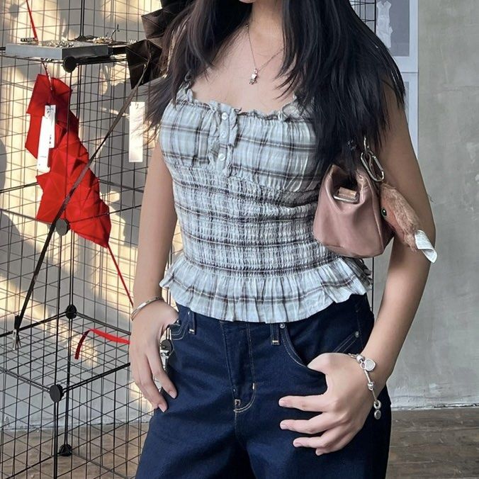 Cotton on gingham gray ruched peplum top (Category: Sleeveless) located in Makati City. Submitted by monu__ (Listing ID 1459408165, Image 1). Description: Gray gingham top Bought in store for 1k+ Size: Small Ruched, peplum, fitted top Cotton on brand, worn only a thrice .